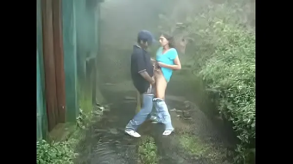 XXX Indian girl sucking and fucking outdoors in rain top Videos