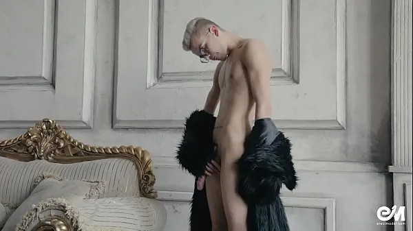 XXX Blond twink boy nude in fur coat shows his long uncut cock top video's