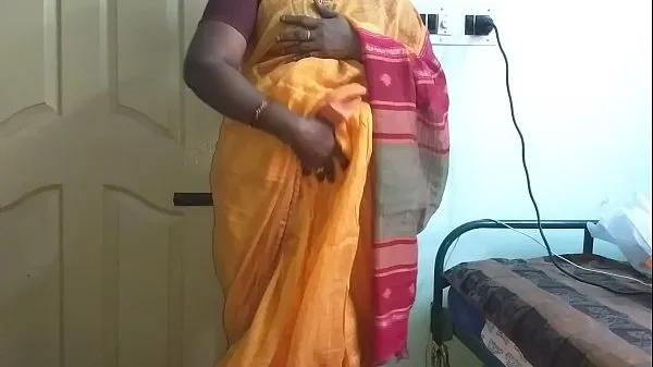 XXX desi indian horny tamil telugu kannada malayalam hindi cheating wife vanitha wearing orange colour saree showing big boobs and shaved pussy press hard boobs press nip rubbing pussy masturbation top video's