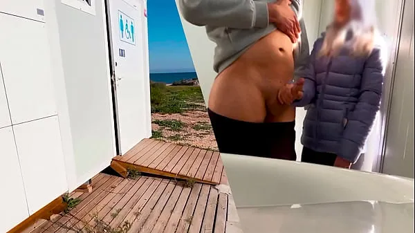 XXX I surprise a girl who catches me jerking off in a public bathroom on the beach and helps me finish cumming top videa